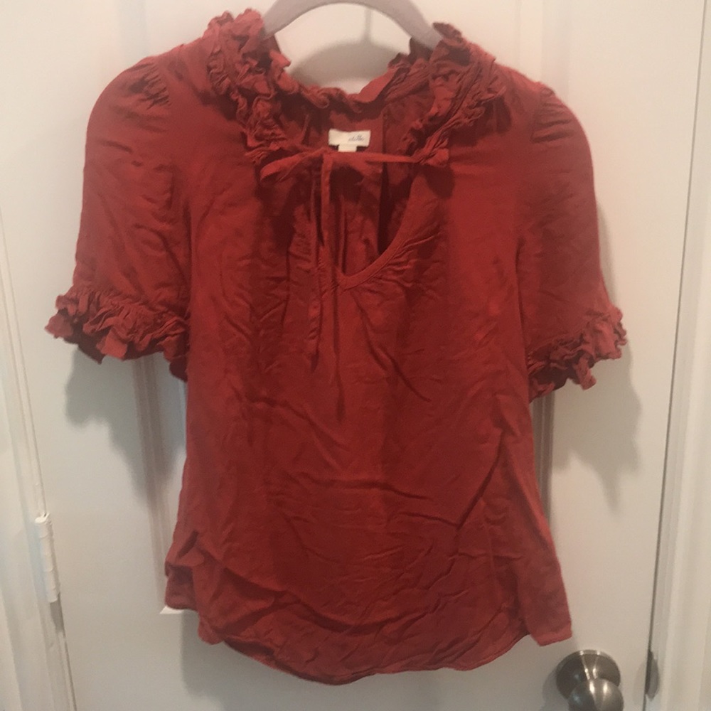 Odille burnt orange frill blouse in size 0